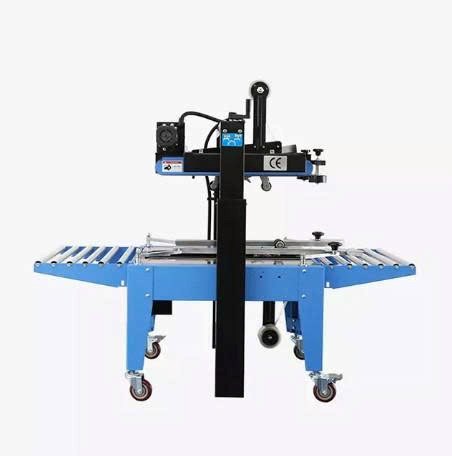 máy dán băng keo thùng carton hualian fxj-6050c hình 1 may dan bang keo thung carton hualian fxj-6050c hinh 1
