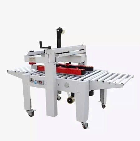máy dán băng keo thùng carton hualian fxj-5050as hình 1 may dan bang keo thung carton hualian fxj-5050as hinh 1